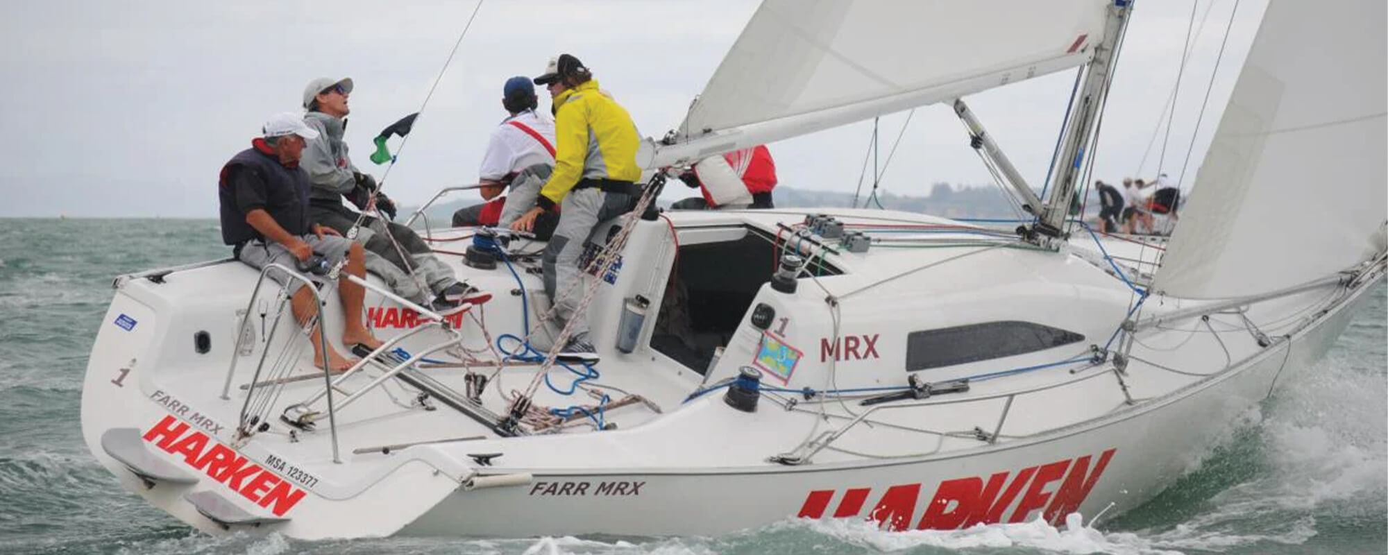 Sailing crew using Harken boat accessories on a large yacht